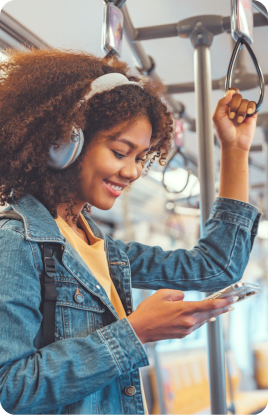 Woman holding electronic device